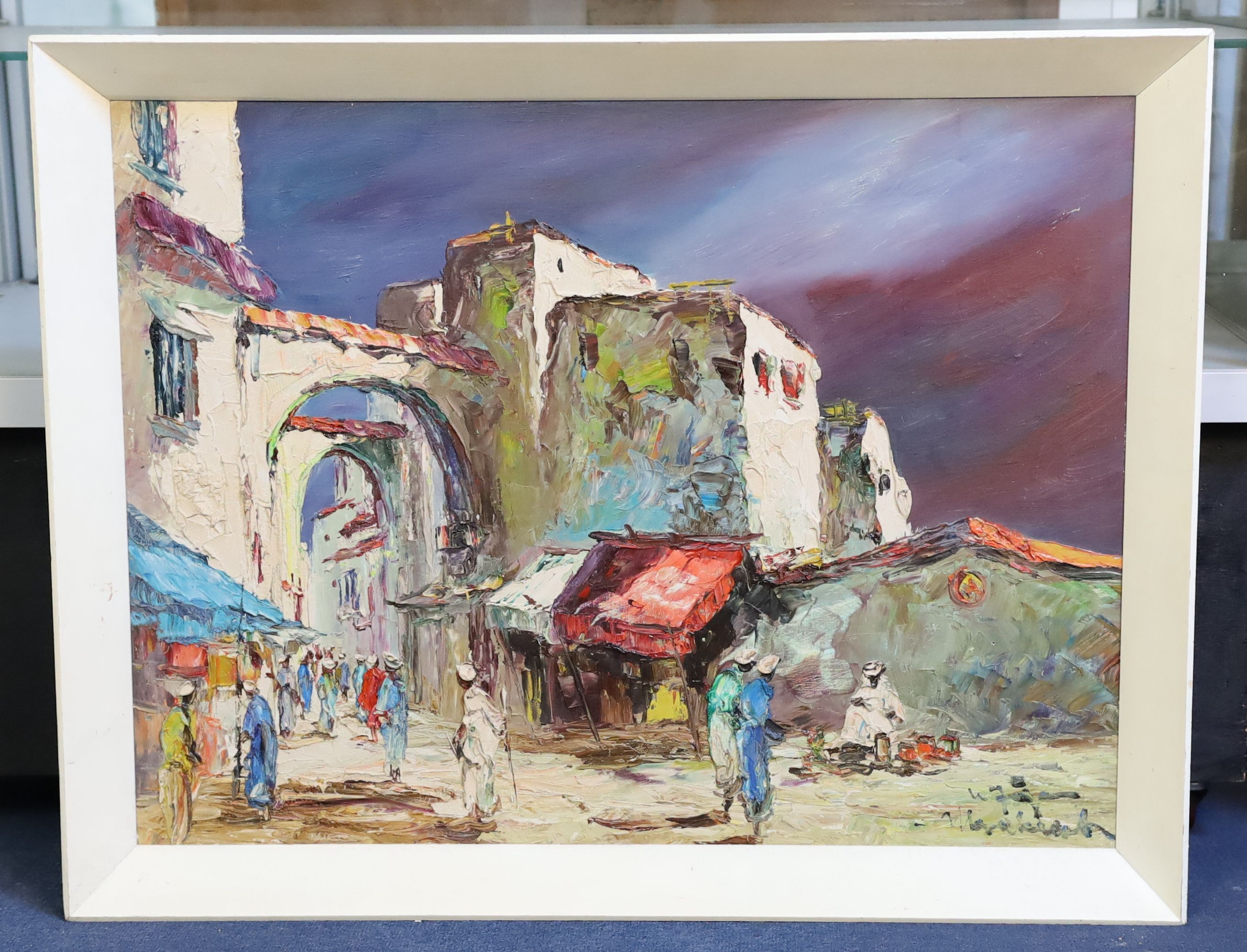 North African School, oil on canvas, Street scene, indistinctly signed, William Rivett label verso, 59 x 78cm